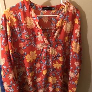 3/4 sleeve 2 button shirt. Nice top for the office.